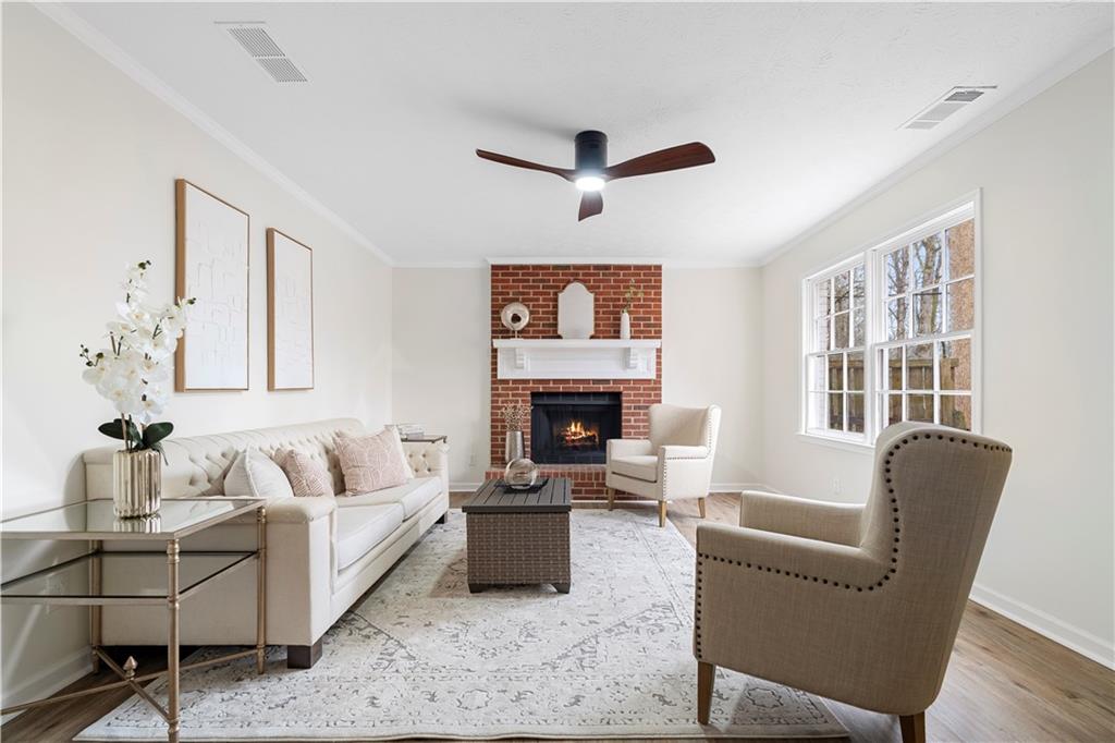 3905 Hunters Chase Southwest Conyers, GA 30094 - Photo 15 of 29 a living room with furniture and a fireplace