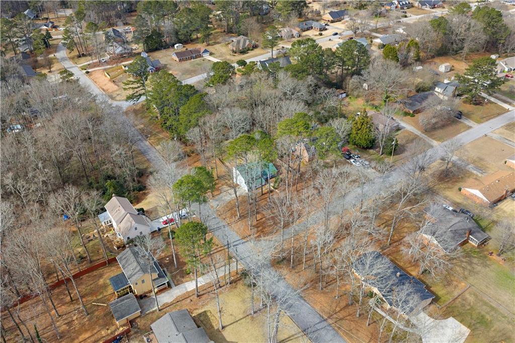 3905 Hunters Chase Southwest Conyers, GA 30094 - Photo 28 of 29 a view of a yard with trees