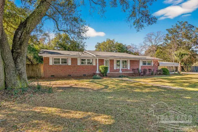 a view of a house with a swimming pool