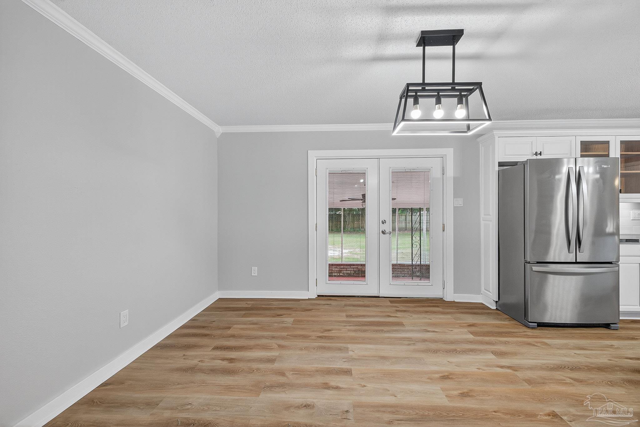 4673 Van Horn Road Milton, FL 32583 - Photo 10 of 48 a view of a kitchen with a sink and refrigerator