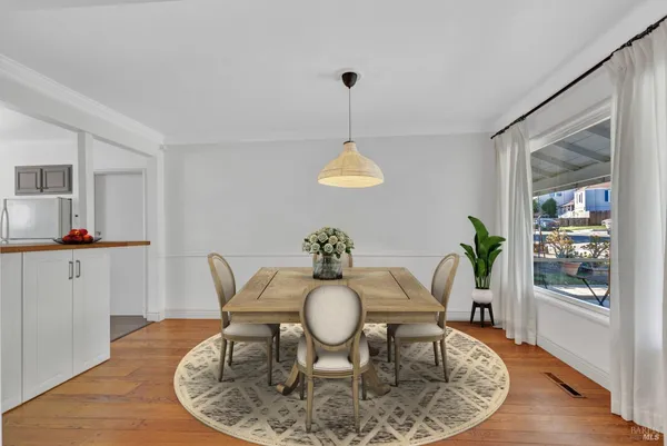a view of a dining room with furniture