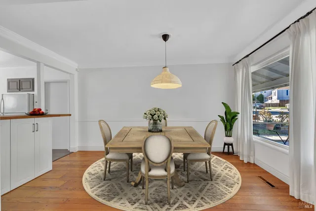 a view of a dining room with furniture
