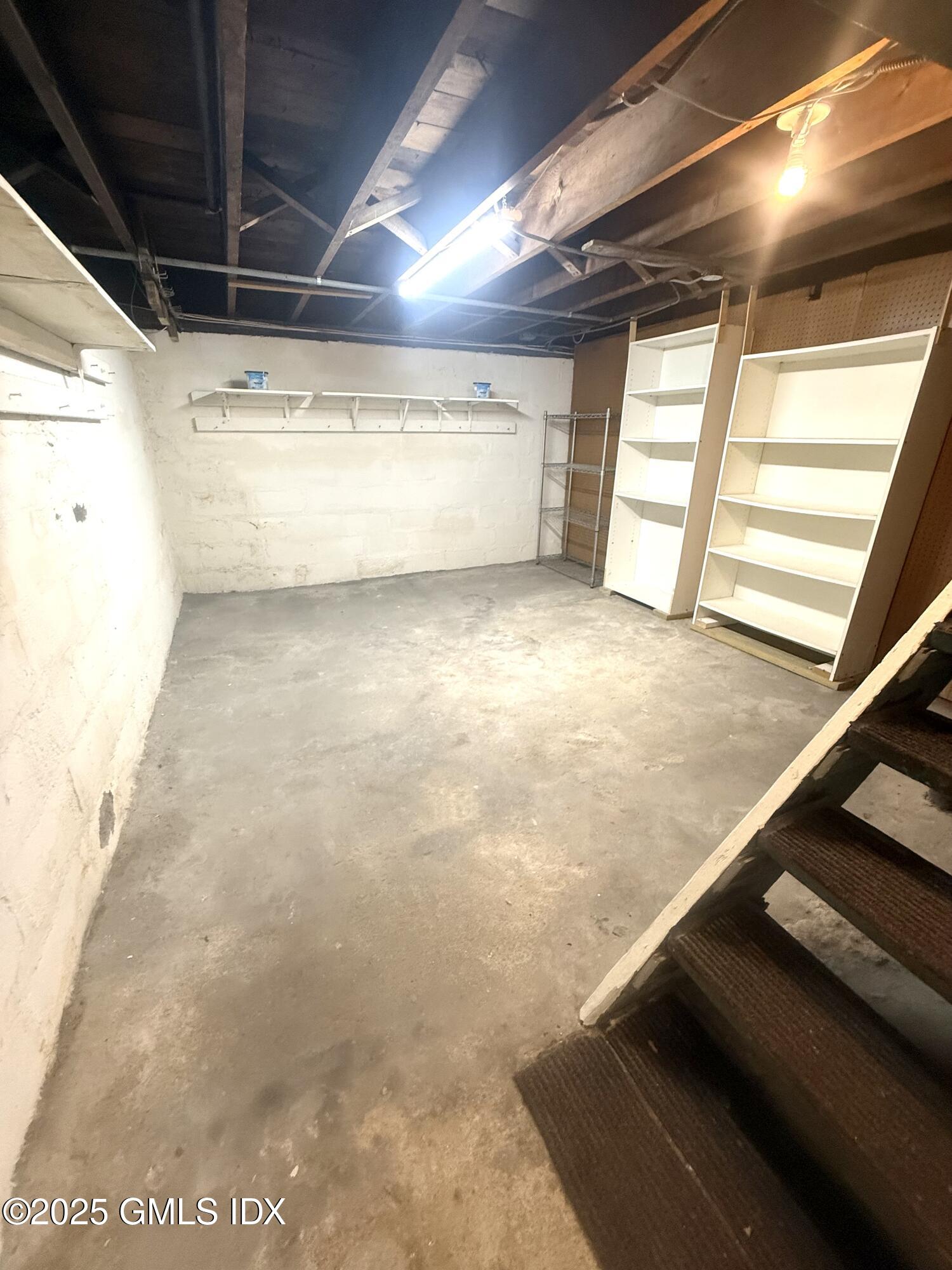 217 River Extension, Unit LOWER LEVEL Cos Cob, CT 06807 - Photo 15 of 16 a view of an empty room