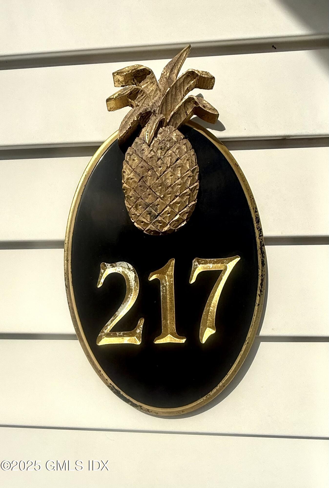 217 River Extension, Unit LOWER LEVEL Cos Cob, CT 06807 - Photo 2 of 16 a black and white photo of a washer