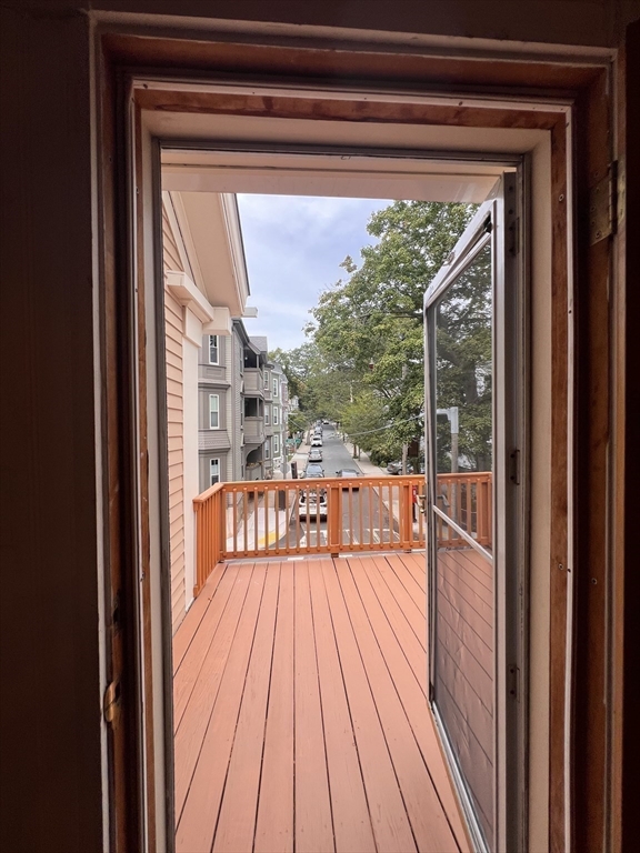 2 Alfred Street Boston, MA 02130 - Photo 2 of 11 a view of living room and wooden floor