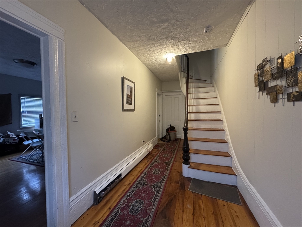 2 Alfred Street Boston, MA 02130 - Photo 3 of 11 a view of entryway and hall with wooden floor