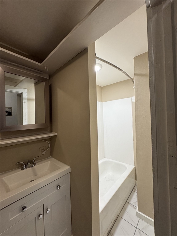 2 Alfred Street Boston, MA 02130 - Photo 6 of 11 a bathroom with a sink and a mirror