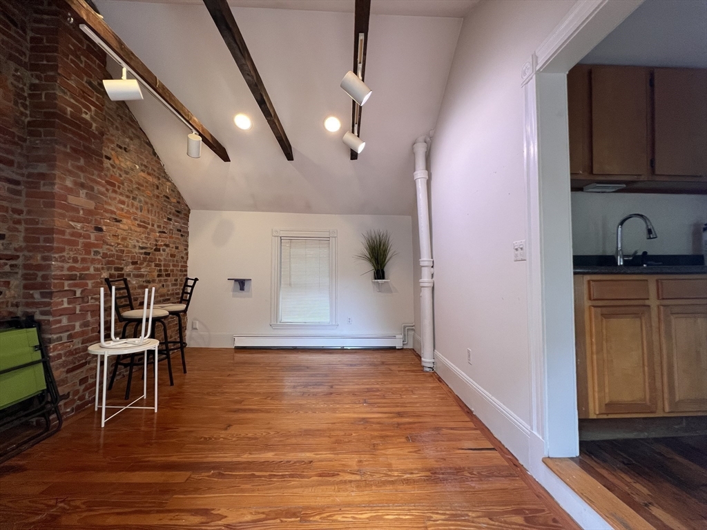 2 Alfred Street Boston, MA 02130 - Photo 9 of 11 a view of a livingroom with furniture and wooden floor