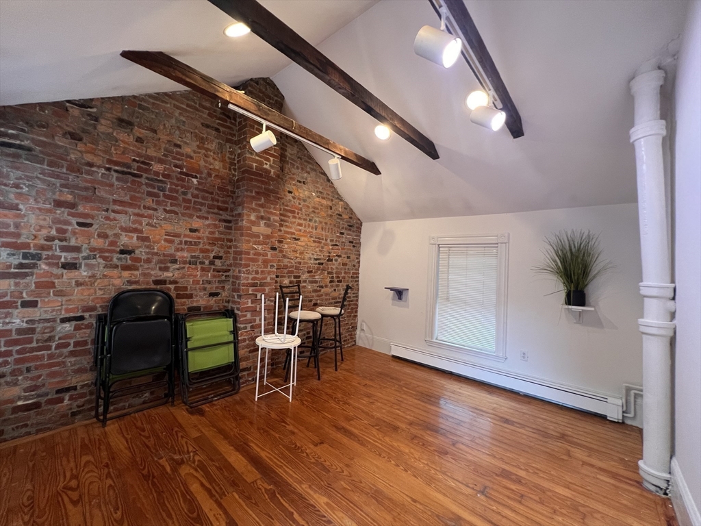 2 Alfred Street Boston, MA 02130 - Photo 10 of 11 a room with furniture and wooden floor