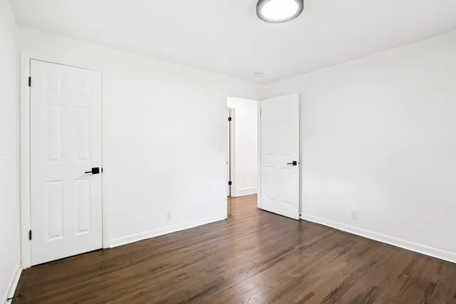 a bathroom with a bathtub and a toilet