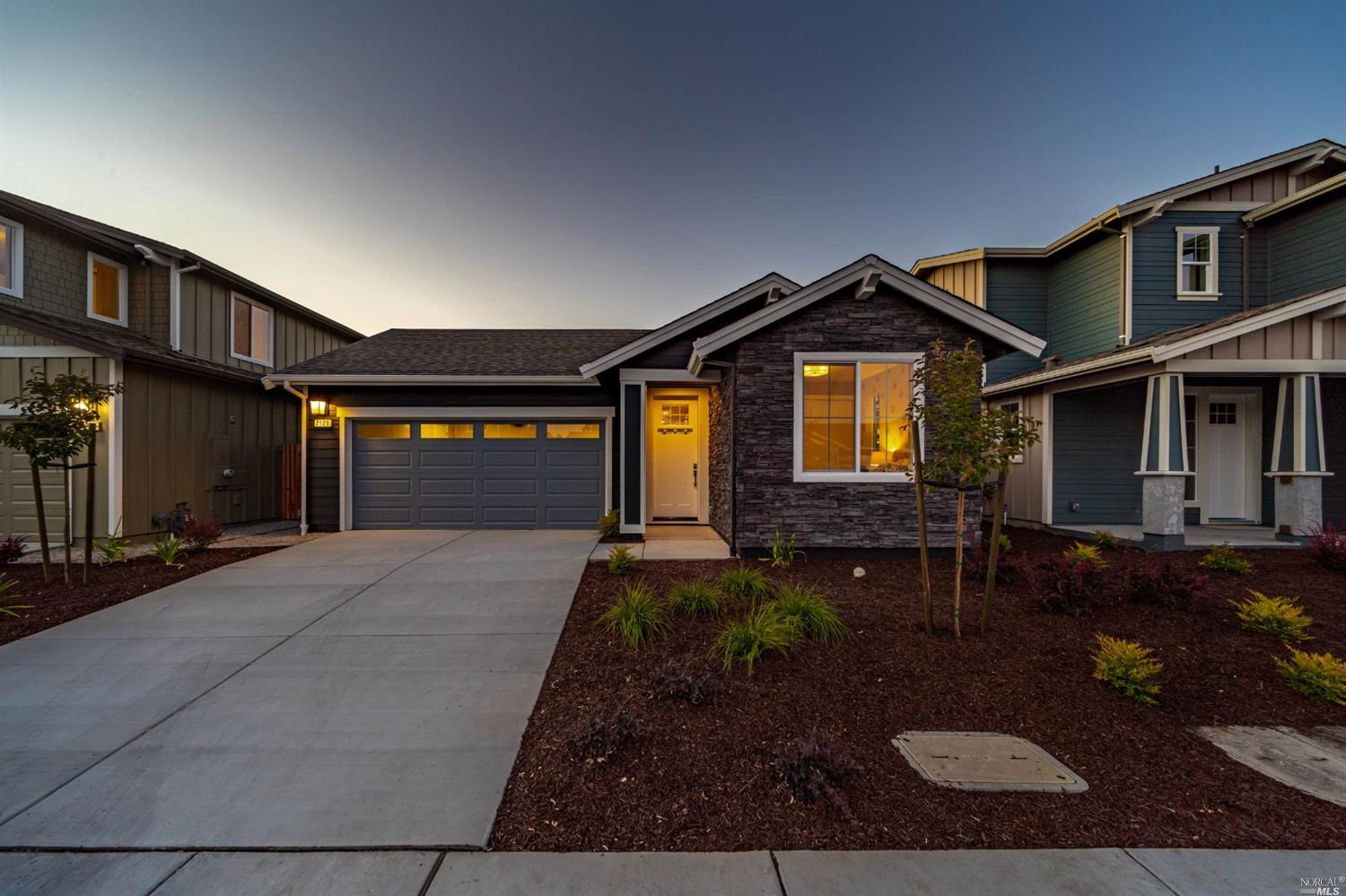 2130 Soleil Way Santa Rosa, CA 95403 - Photo 1 of 1 a front view of a house with garden