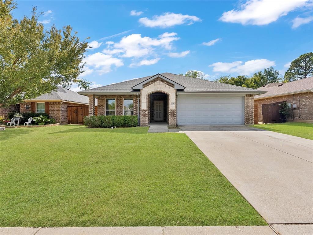 810 Ranch Road Dallas, TX 75253 - Photo 4 of 28 Ranch-style house featuring concrete driveway, a shingled roof, an attached garage, and brick siding
