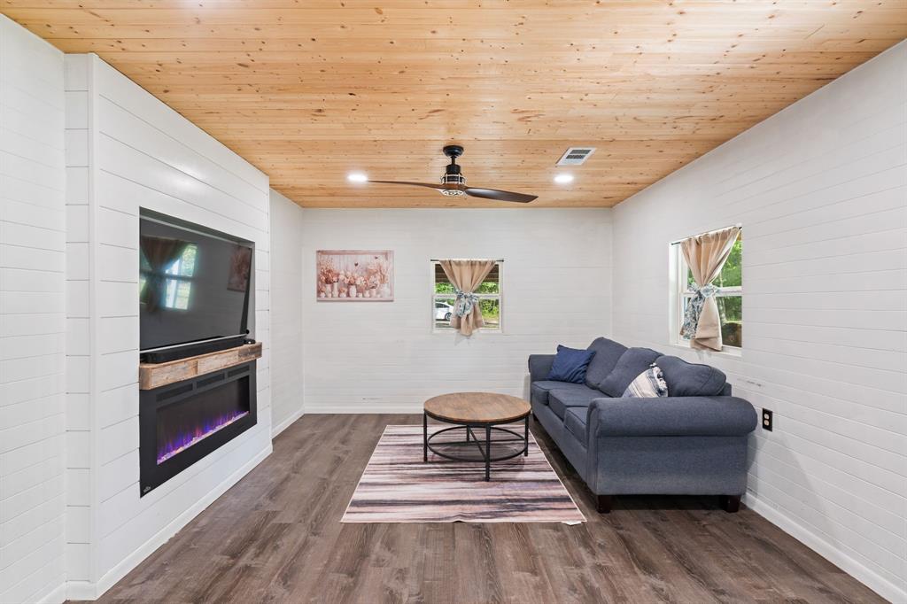 17790 County Road 345 Terrell, TX 75161 - Photo 14 of 37 a living room with furniture and a wooden floor