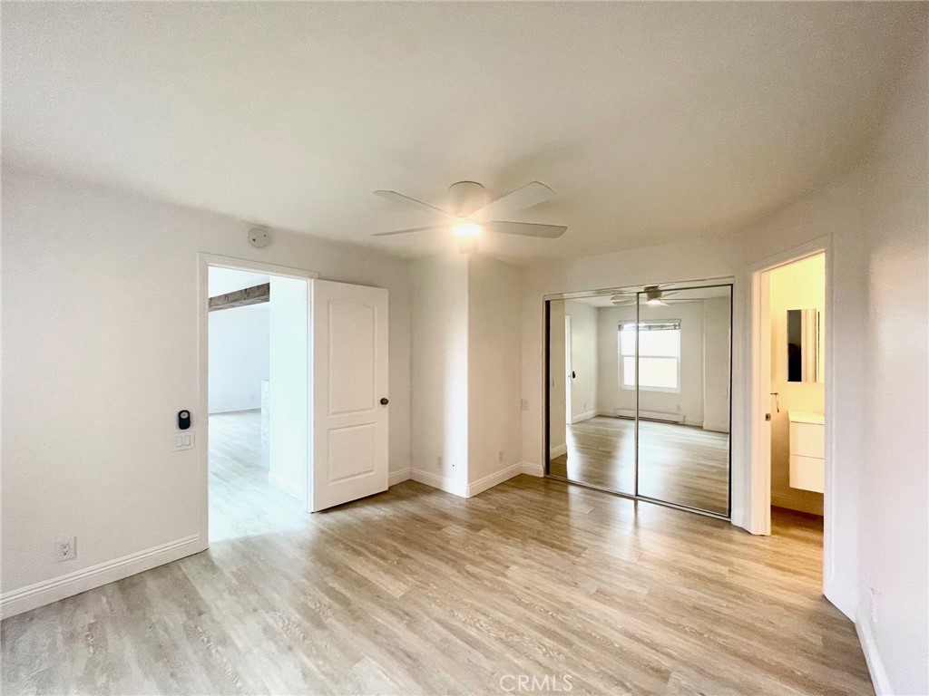 352 Y Place Laguna Beach, CA 92651 - Photo 13 of 22 a view of empty room with wooden floor