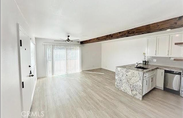 352 Y Place Laguna Beach, CA 92651 - Photo 22 of 22 a living room with stainless steel appliances granite countertop a hardwood floor sink and stove