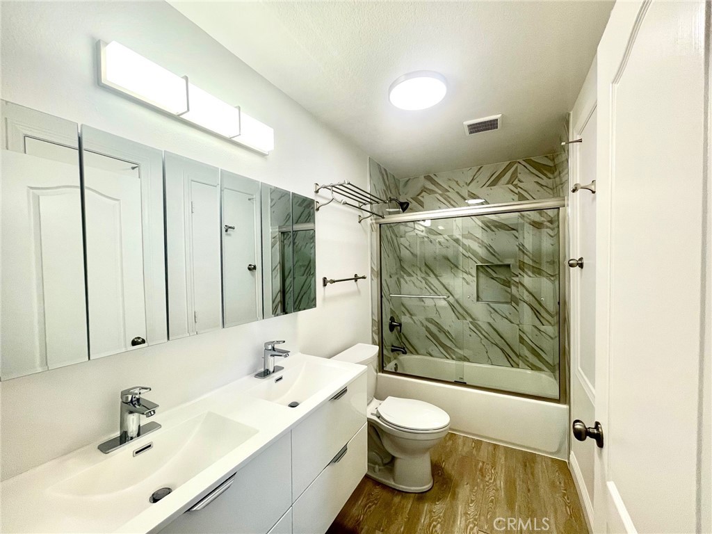 352 Y Place Laguna Beach, CA 92651 - Photo 9 of 22 a bathroom with a sink toilet and shower