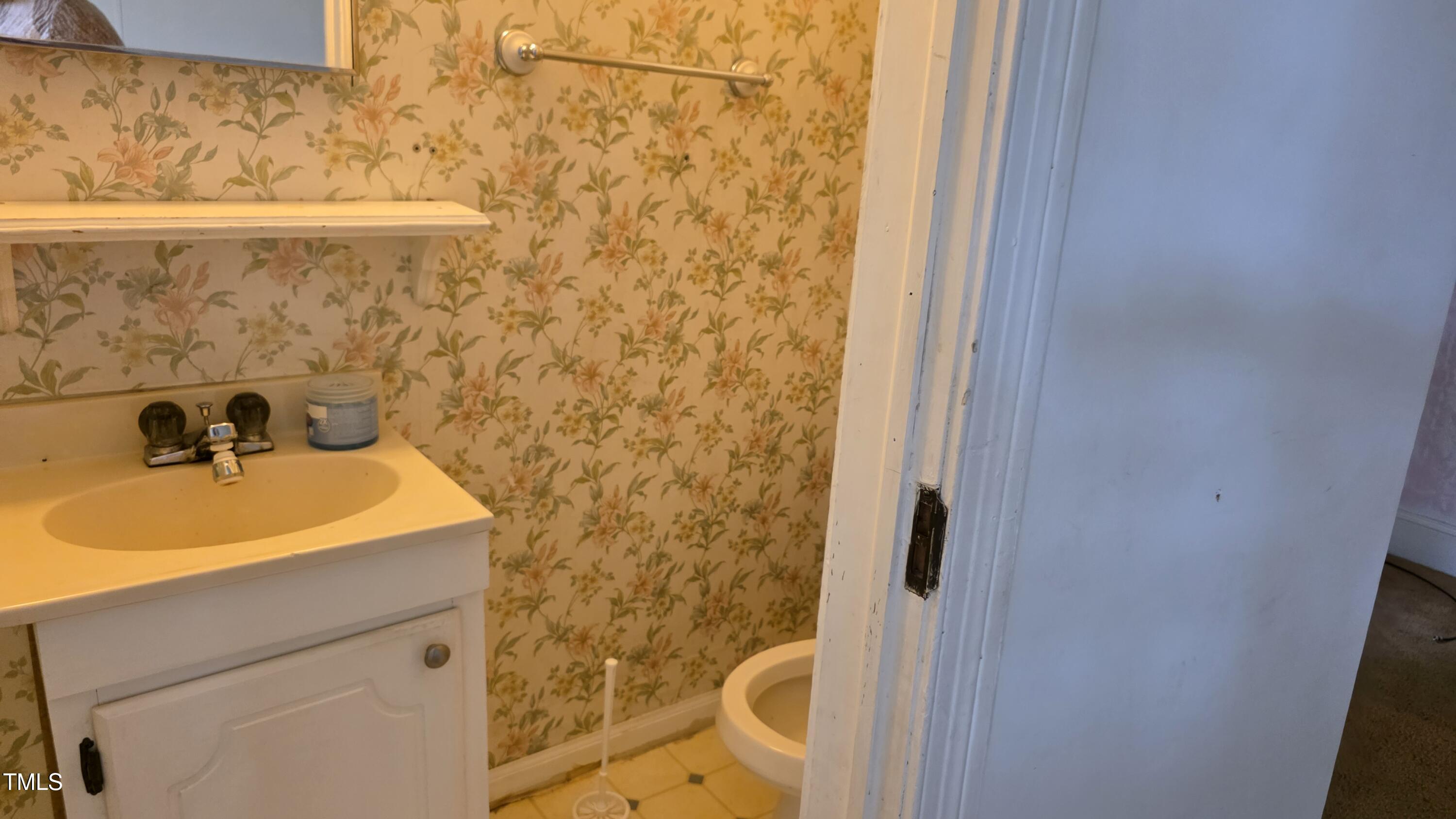 1015 Wait Avenue Wake Forest, NC 27587 - Photo 14 of 19 a bathroom with a sink and a shower