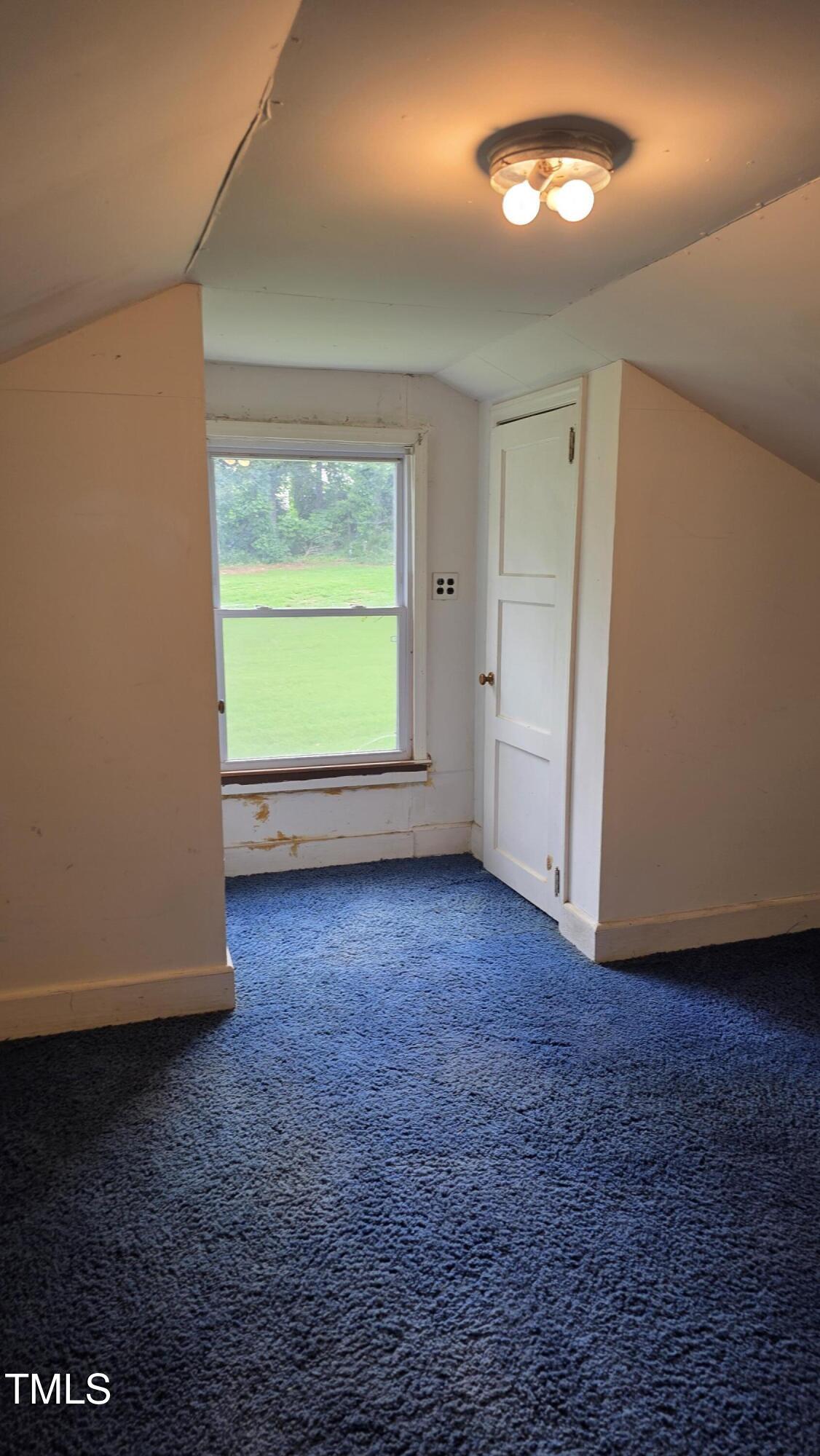 1015 Wait Avenue Wake Forest, NC 27587 - Photo 17 of 19 a view of an empty room with a window
