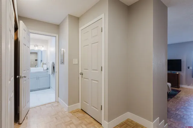 a bathroom with a shower and a sink