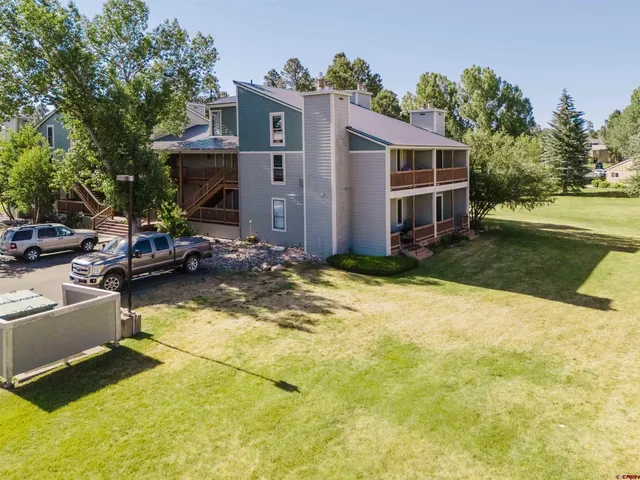 a view of a house with swimming pool