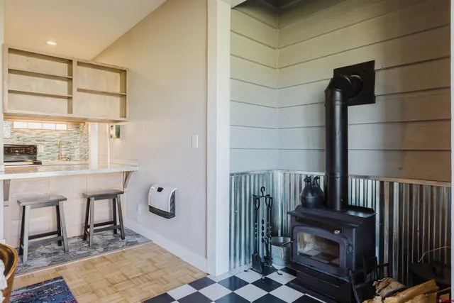 a view of hallway with wooden floor