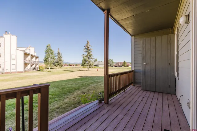 a view of a lake with a big yard