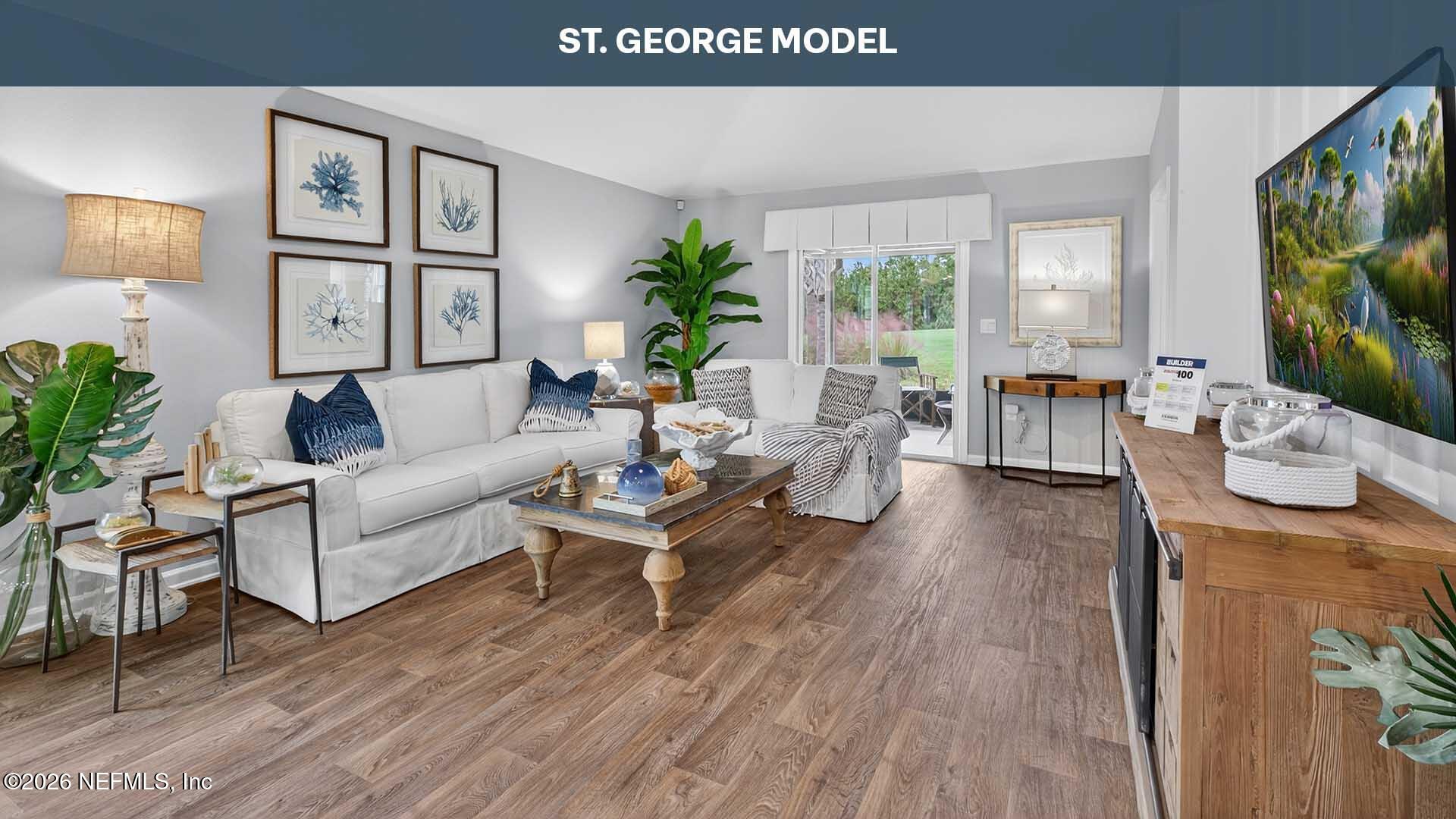 47 Mulligan Way Bunnell, FL 32110 - Photo 13 of 52 a living room with furniture and a flat screen tv