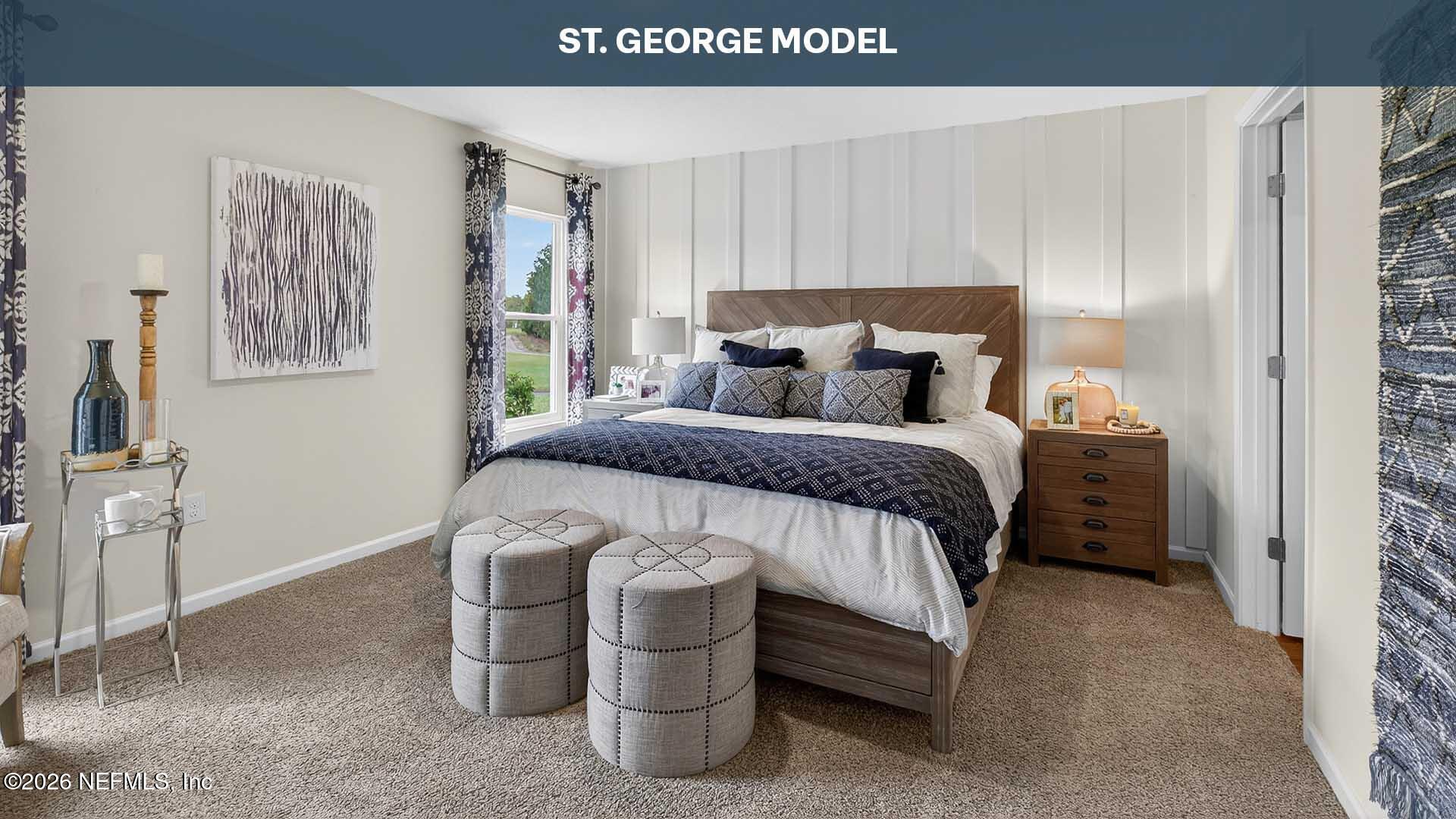 47 Mulligan Way Bunnell, FL 32110 - Photo 15 of 52 a bedroom with a bed and a cabinets