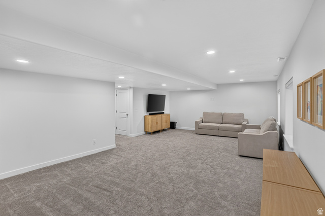 2178 Autumn Drive Mapleton, UT 84664 - Photo 35 of 48 Spacious room featuring gray carpeting, recessed ceiling lighting, and multiple windows