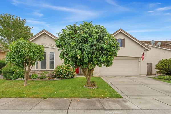 a house view with a garden space