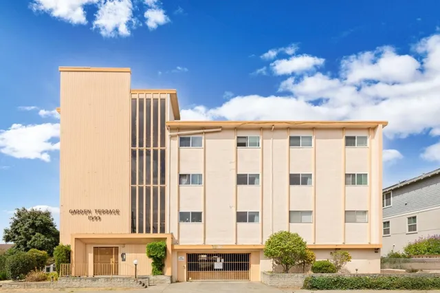 a view of a building with a street