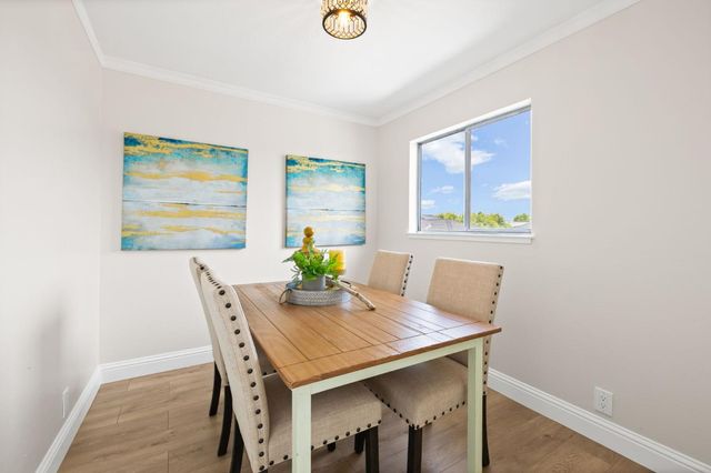 a view of a dining room with furniture