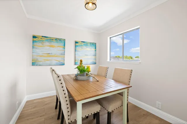 a view of a dining room with furniture
