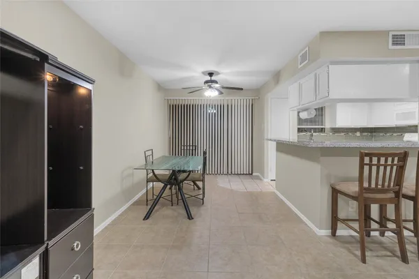 a view of work space with cabinets