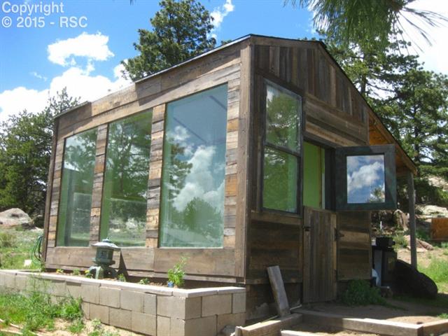 249 Chipper Road Guffey, CO 80820 - Photo 2 of 13 Year Round Green House Growing. Big Southern Exposure.