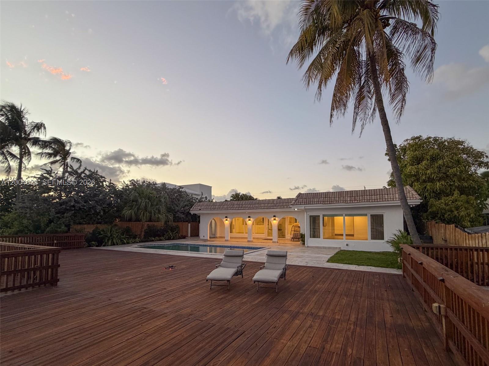 1690 Daytonia Road Miami Beach, FL 33141 - Photo 36 of 88 an outdoor view with patio