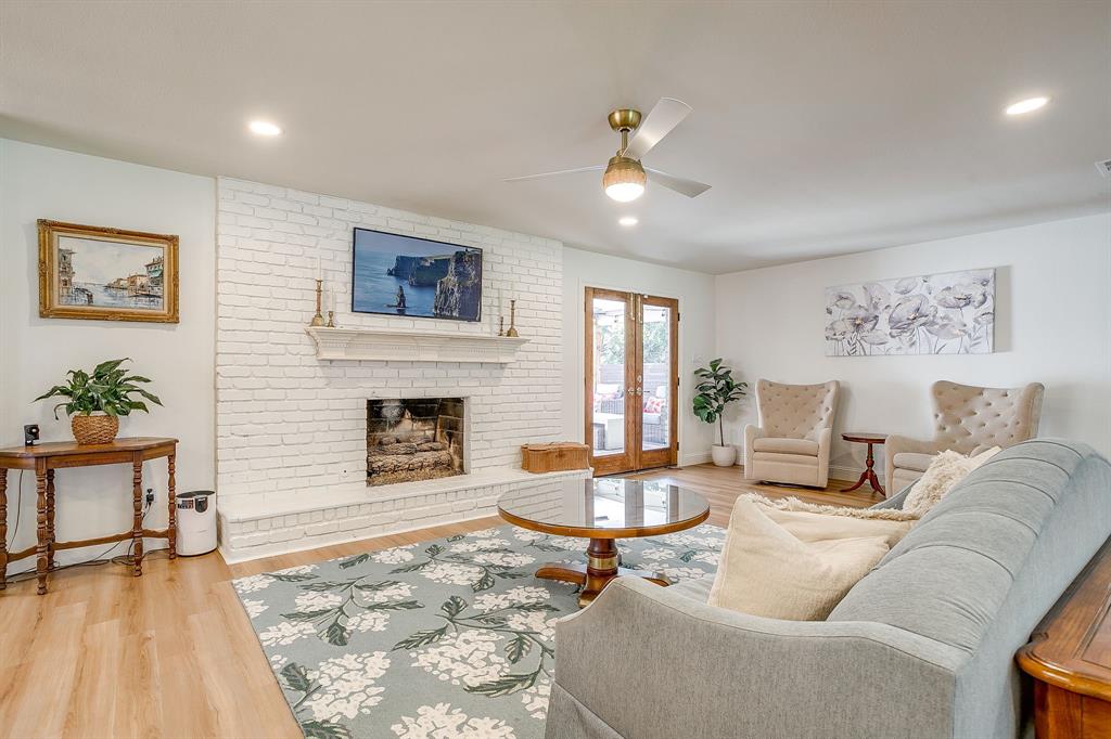 4521 Cloudview Road Fort Worth, TX 76109 - Photo 11 of 40 a living room with furniture and a fireplace