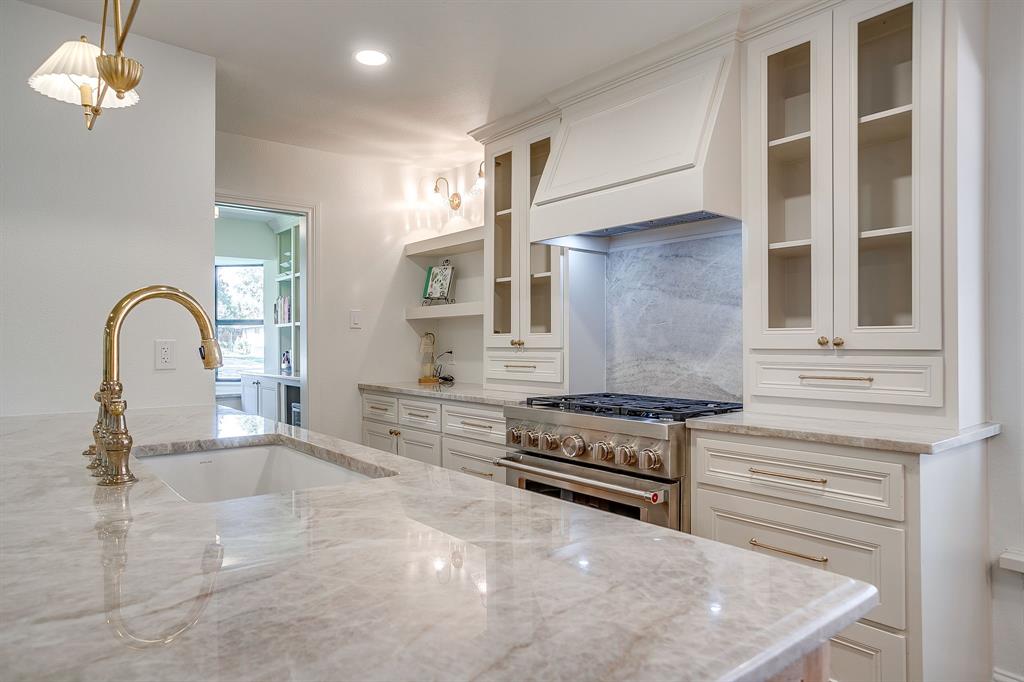 4521 Cloudview Road Fort Worth, TX 76109 - Photo 14 of 40 a view of a kitchen with a stove