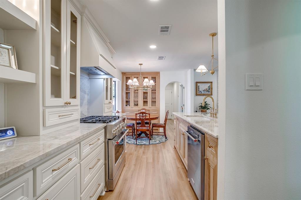 4521 Cloudview Road Fort Worth, TX 76109 - Photo 16 of 40 a large kitchen with granite countertop lots of counter top space
