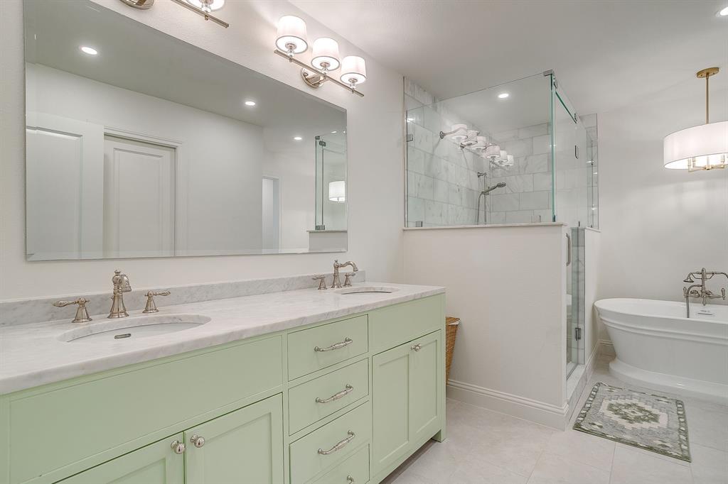 4521 Cloudview Road Fort Worth, TX 76109 - Photo 24 of 40 a bathroom with a sink a toilet and a mirror