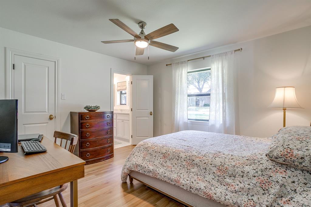 4521 Cloudview Road Fort Worth, TX 76109 - Photo 29 of 40 a bedroom with a bed and a desk