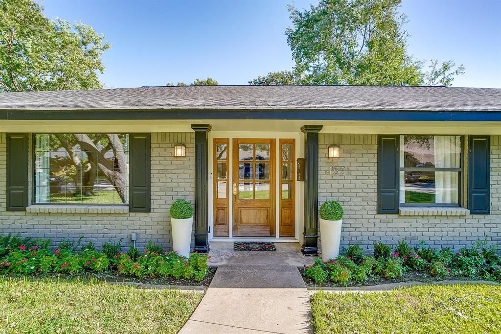 4521 Cloudview Road Fort Worth, TX 76109 - Photo 4 of 40 a front view of a house with a garden