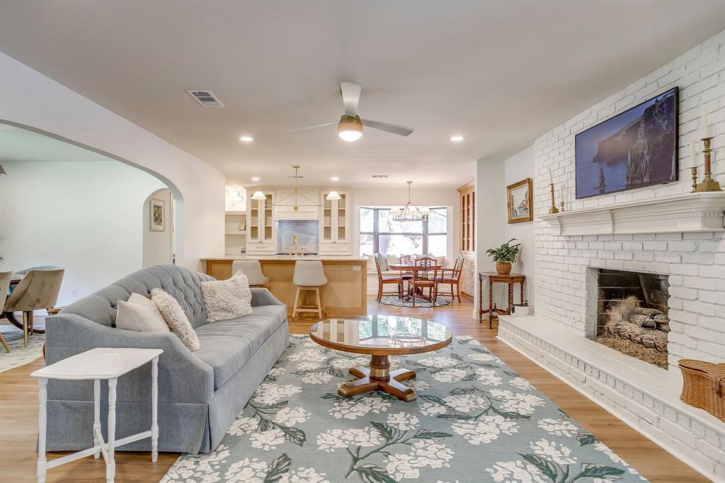 4521 Cloudview Road Fort Worth, TX 76109 - Photo 9 of 40 a living room with furniture and a fireplace