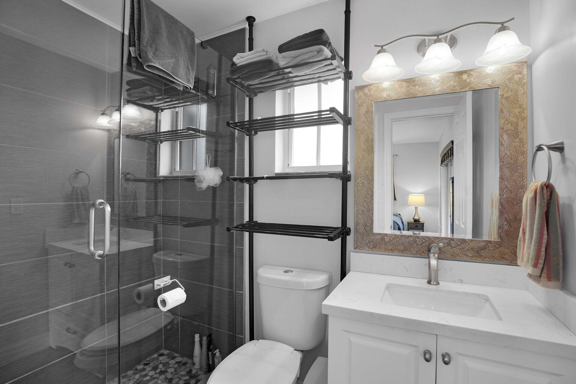 38 Calle Uno Key West, FL 33040 - Photo 11 of 13 a bathroom with a sink toilet and shower