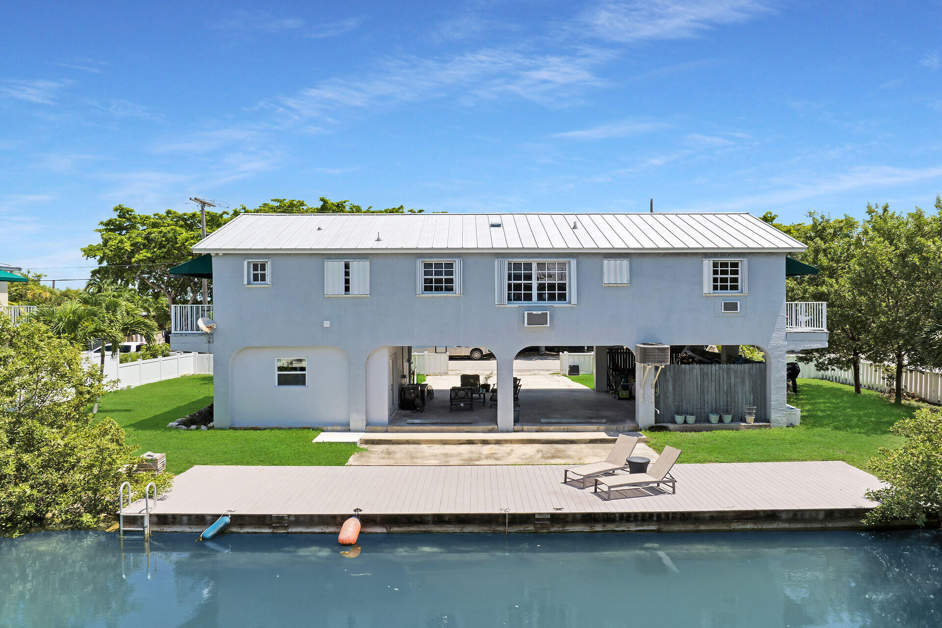 38 Calle Uno Key West, FL 33040 - Photo 13 of 13 a view of house with swimming pool and a yard