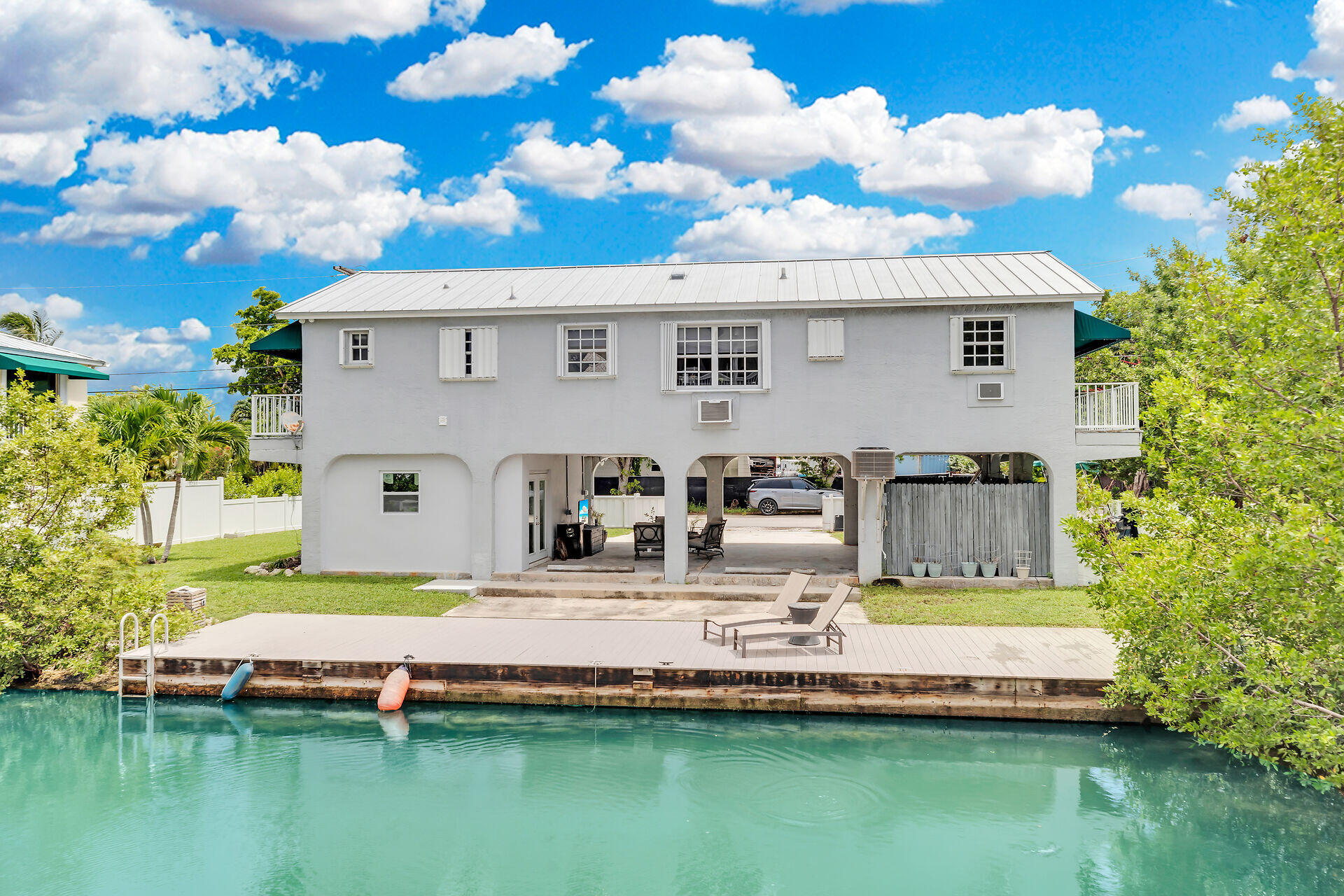 38 Calle Uno Key West, FL 33040 - Photo 2 of 13 a swimming pool with outdoor seating and yard