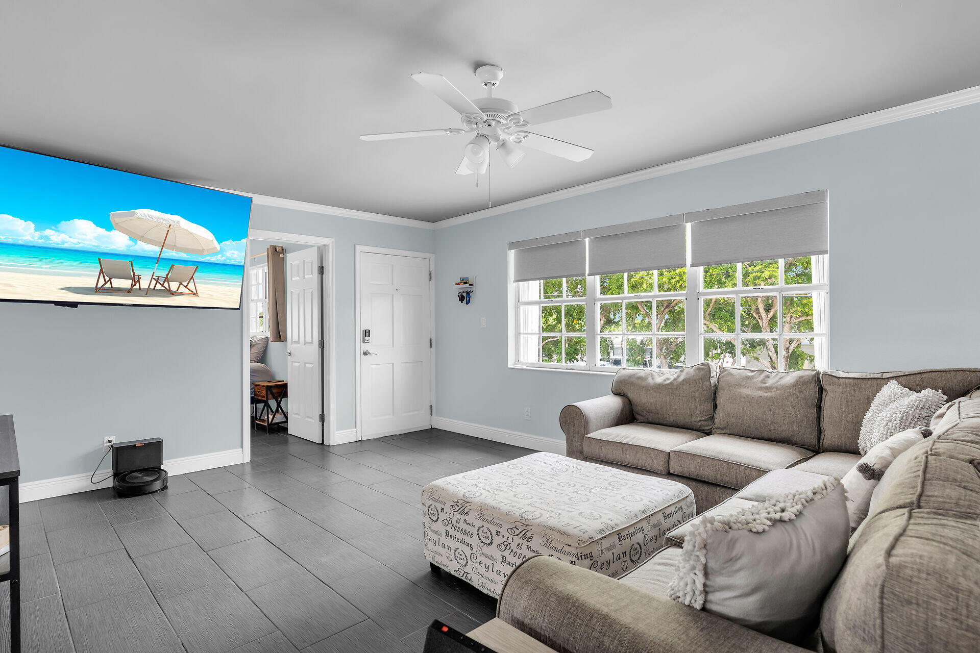 38 Calle Uno Key West, FL 33040 - Photo 6 of 13 a living room with furniture and a large window