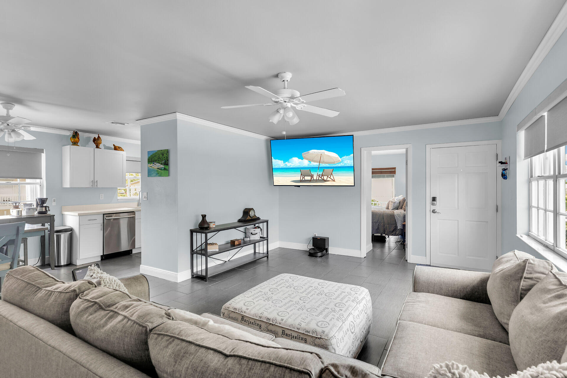 38 Calle Uno Key West, FL 33040 - Photo 7 of 13 a living room with furniture and a flat screen tv
