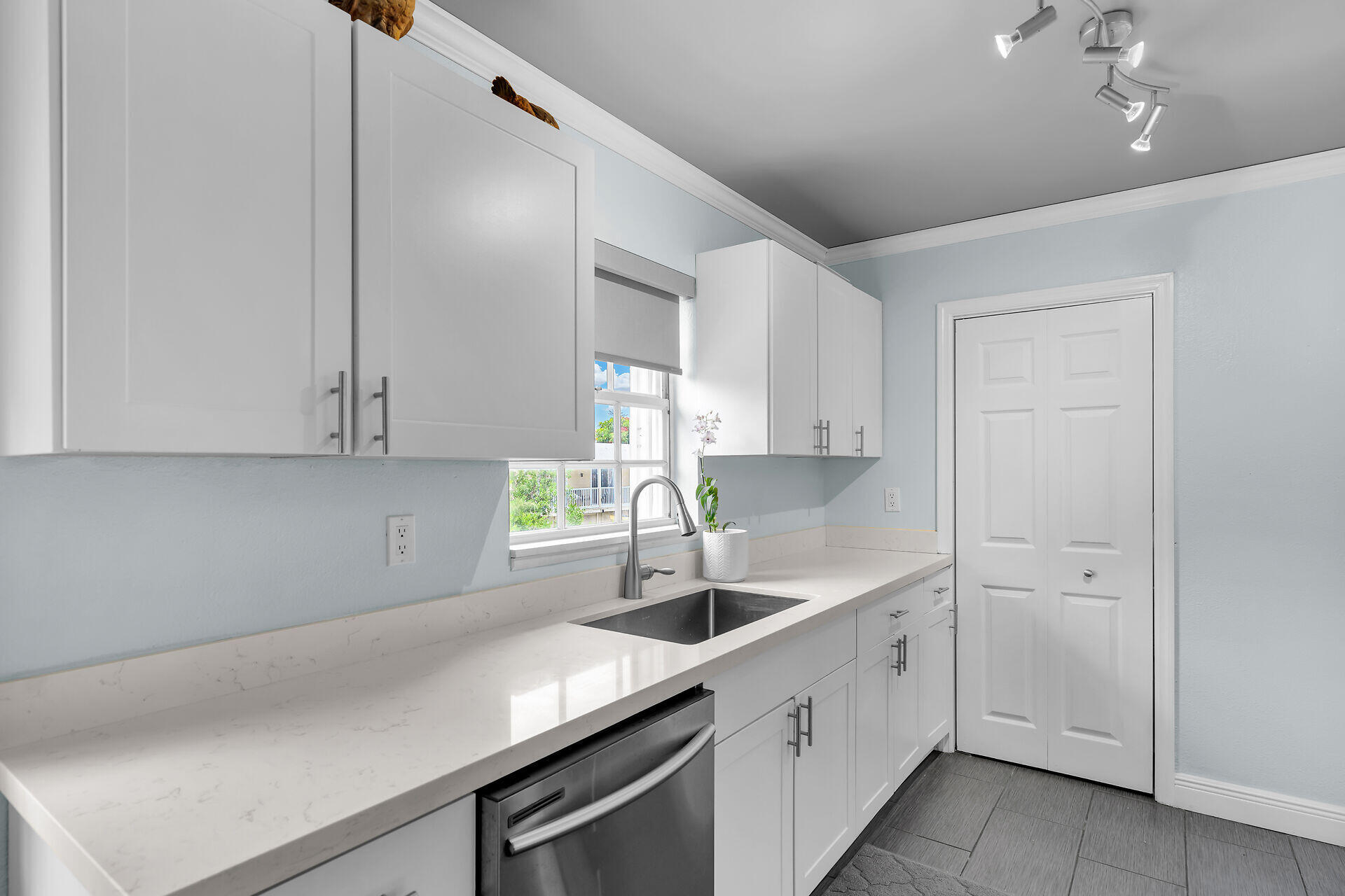 38 Calle Uno Key West, FL 33040 - Photo 8 of 13 a kitchen with a sink cabinets and window