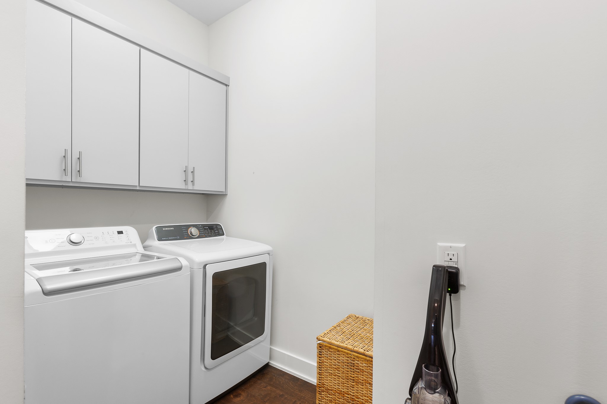 3101 Sunnylawn Circle, Unit B Austin, TX 78723 - Photo 16 of 32 Laundry area featuring cabinet space and washer and dryer